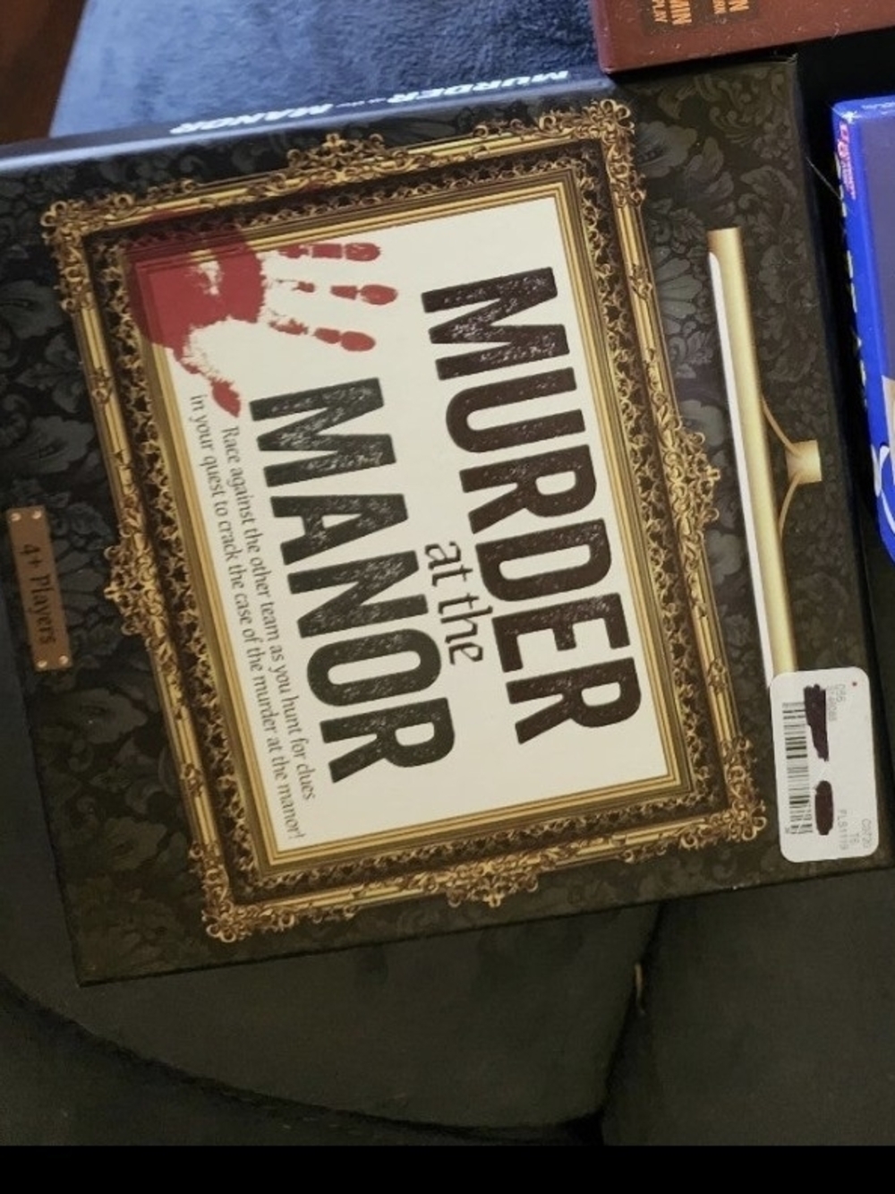 Murder at the Manor Game - Black and Gold Box
